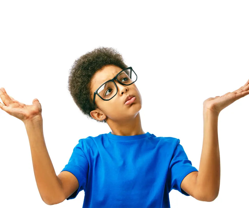 Boy shrugging with a questioning expression