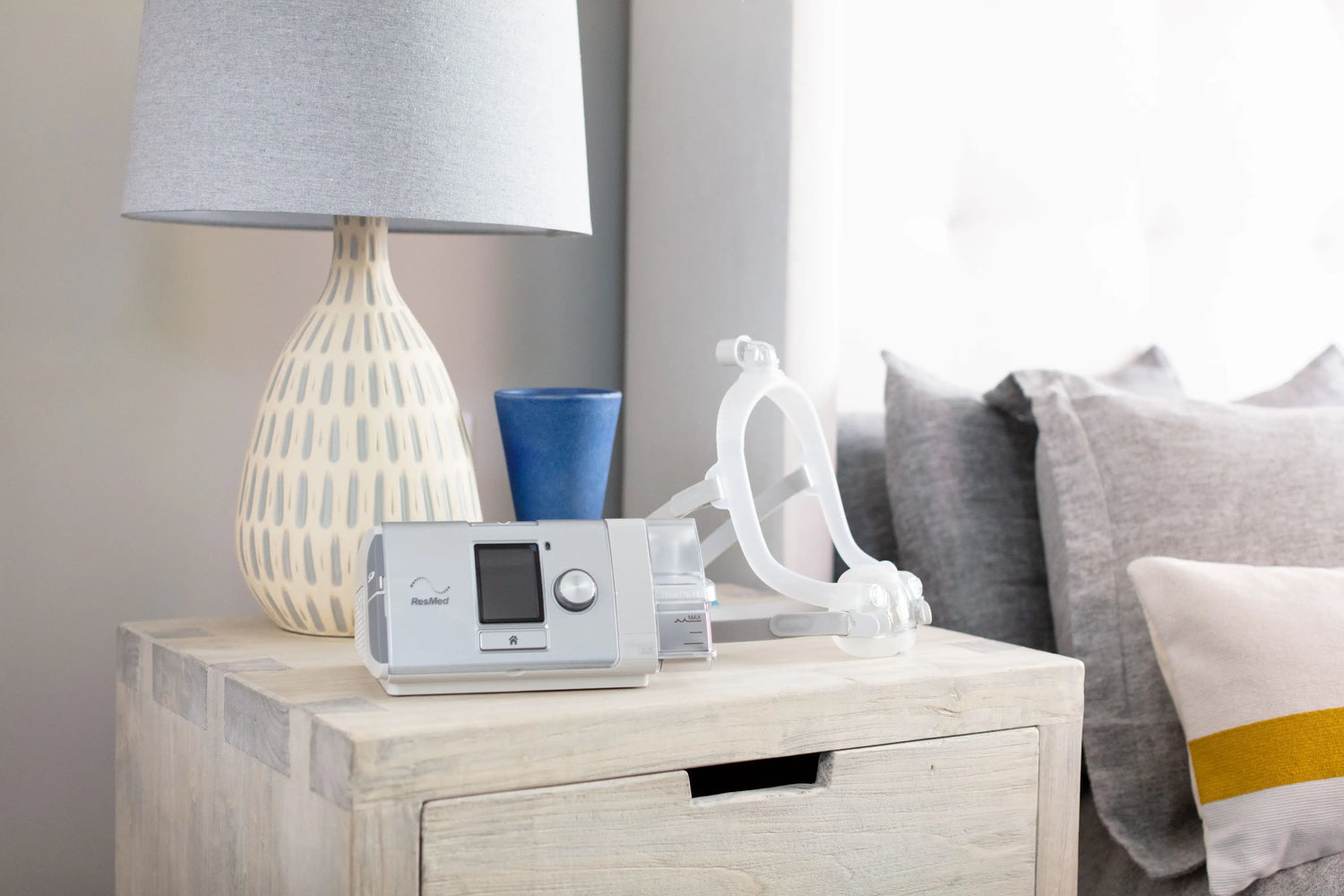 A cpap machine with mask in the desk