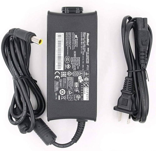 A black ResMed AirSense 10 Power Supply with attached power cable and label.