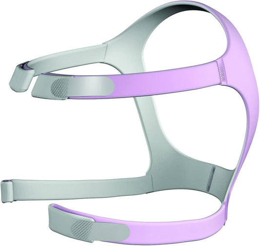 A purple and gray ResMed Mirage FX nasal CPAP mask headgear designed for her, with adjustable straps and a soft fabric structure.
