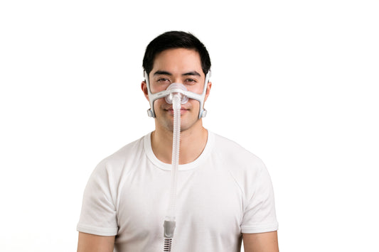 A man wearing the AirFit N20 Nasal Face CPAP Mask