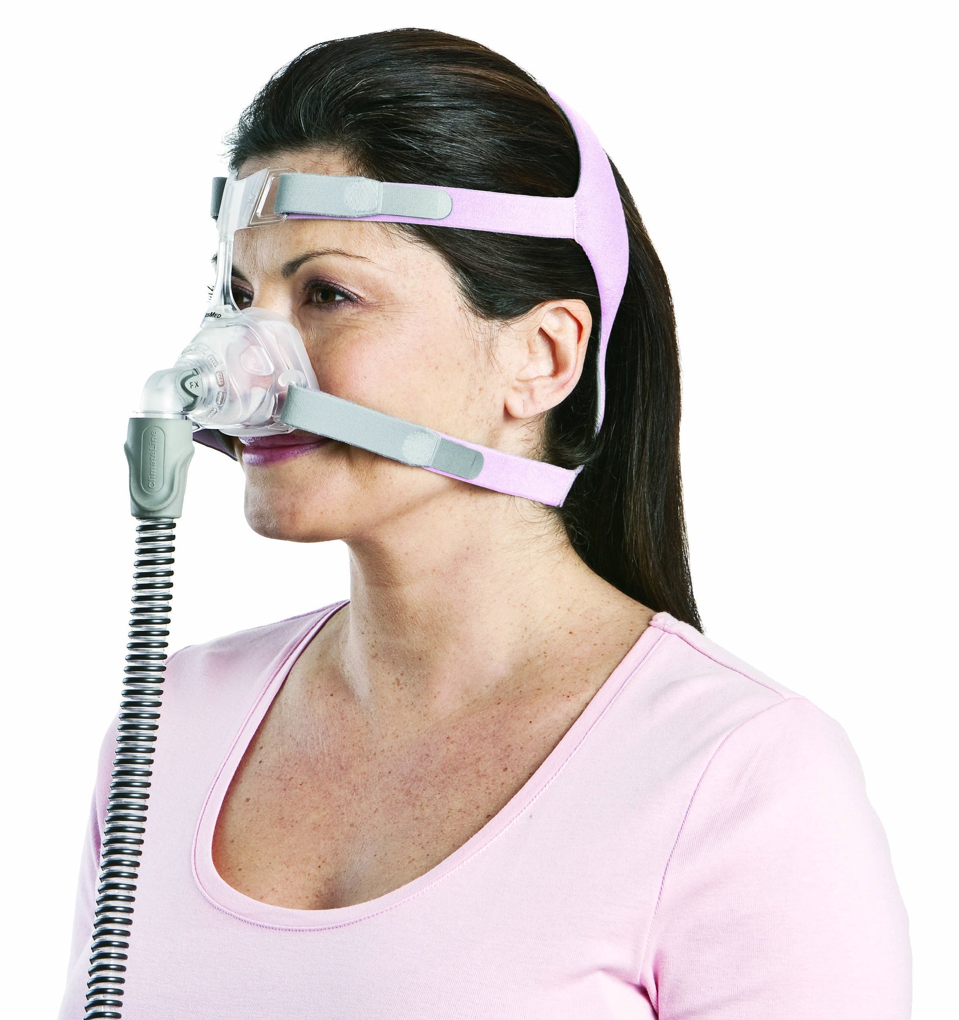 a woman wearing Mirage FX Nasal CPAP Mask for Her