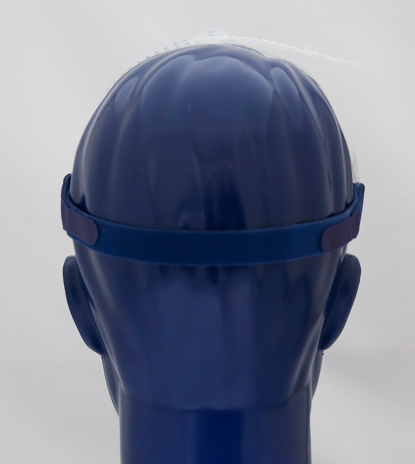 the back of mannequin wearing Swift FX Nasal Pillow CPAP Mask Headgear