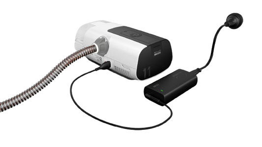 The ResMed AirSense 11 machine connected to AirSense 11 Power Supply
