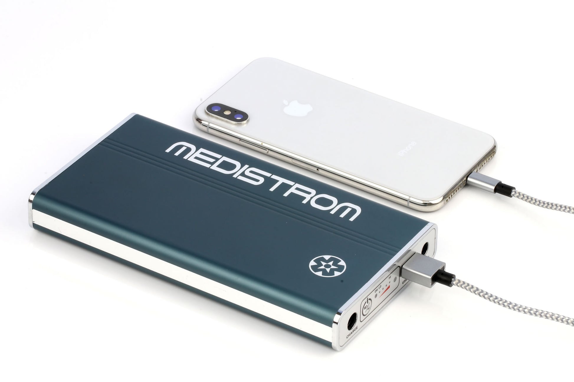 The Pilot 12 Lite CPAP Travel Battery connected to a mobile phone