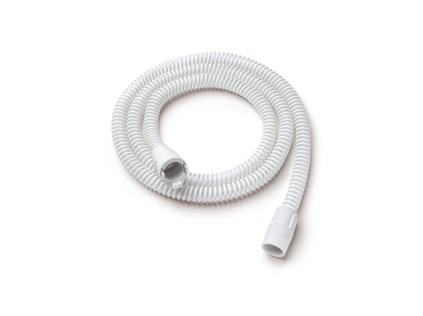 A coiled, white heated tubing designed for use with DreamStation 1 and 2 by Philips Respironics, featuring connectors at both ends.