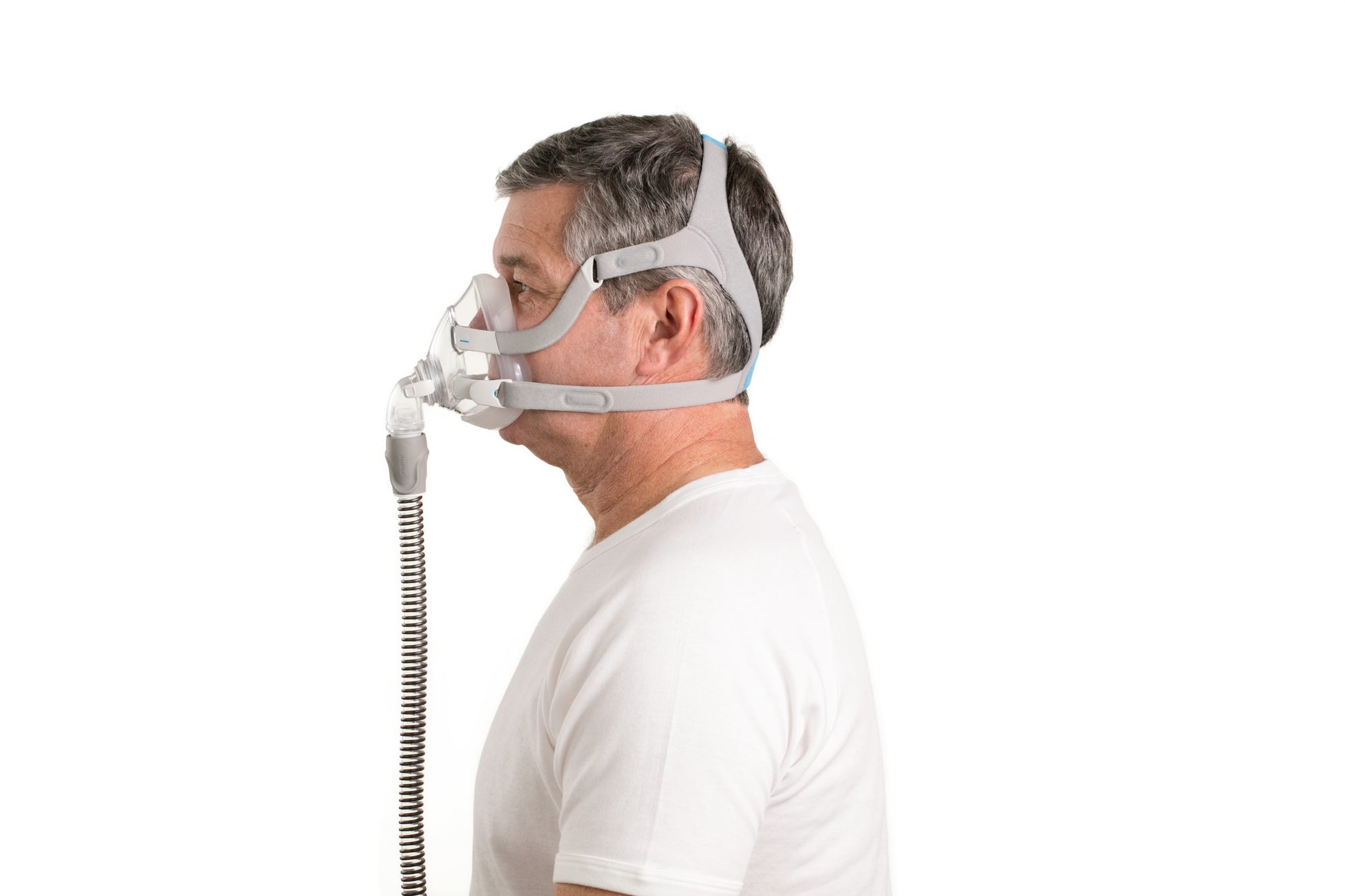 A man's side view wearing the AirFit F20 Full Face CPAP Mask