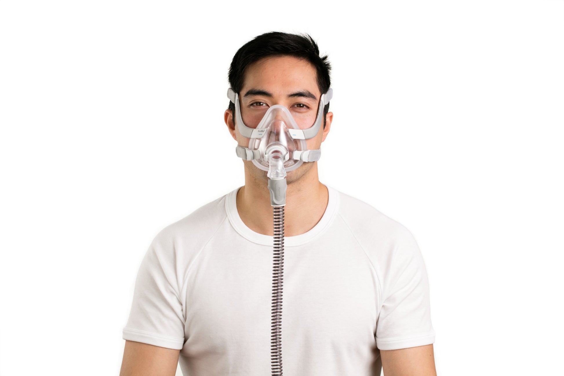 A man wearing AirFit F20 Full Face CPAP Mask by ResMed