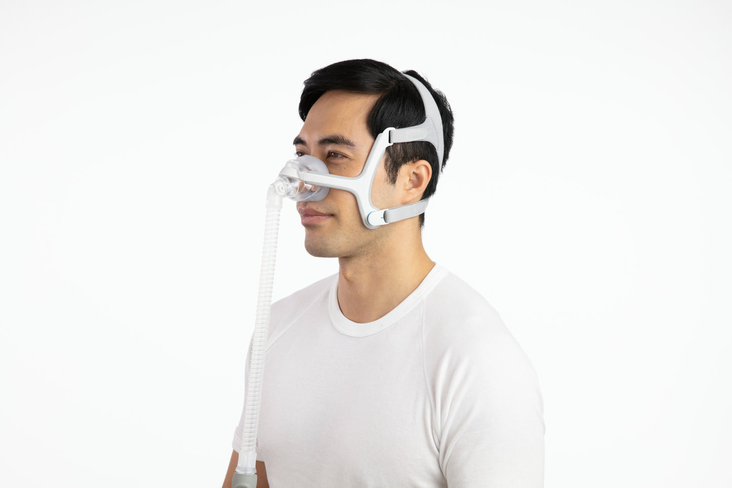 A man wearing the ResMed AirTouch N20 Nasal CPAP Mask comfortably