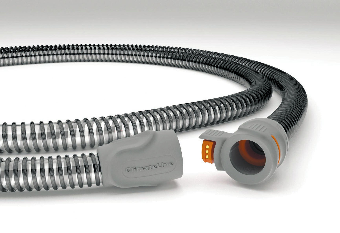 The ClimateLineAir Heated Tubing for ResMed AirSense 9 and AirCurve 9; A coiled, heated tubing with a connector for CPAP machines, featuring a gray external surface and an internal heated coil.