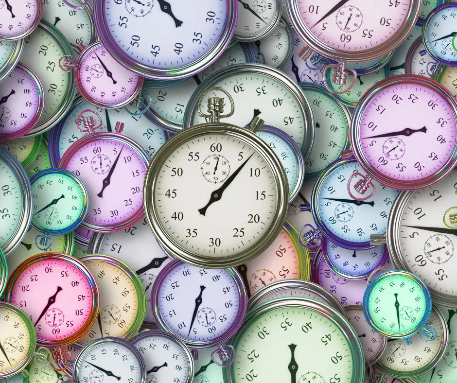 A pile of colorful stopwatches showing different ramp times.