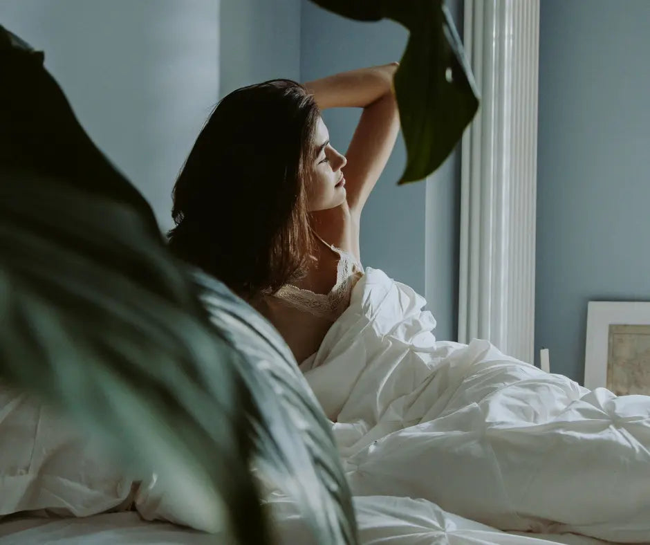 A Woman Waking Up on a Bedroom