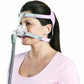 a woman wearing Mirage FX Nasal CPAP Mask for Her