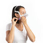 A woman trying on the AirTouch N20 Nasal CPAP Mask For Her